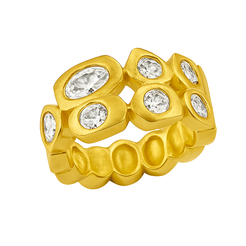 Gold ring with diamond-studded design on a white background