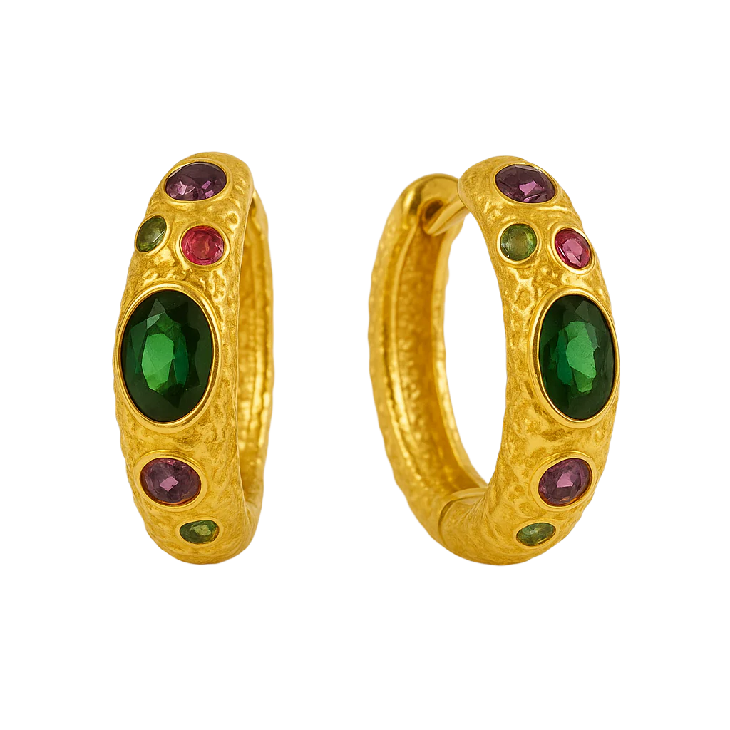 Gold hoop earrings with green and red gemstones on a white background