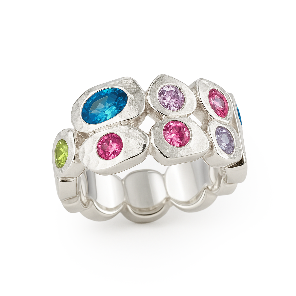 Silver ring with multicolored gemstones on a white background