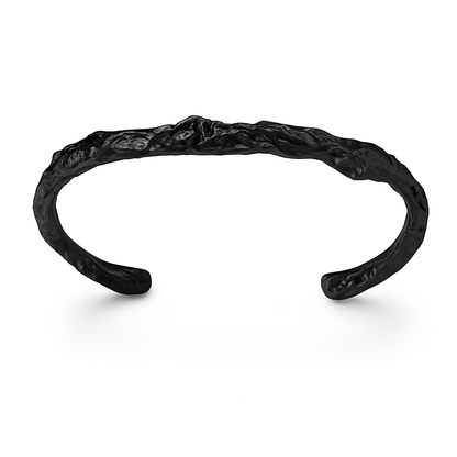 Black textured bracelet on a white background