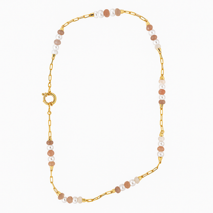 Necklace with gold chain and multicolored beads on a white background