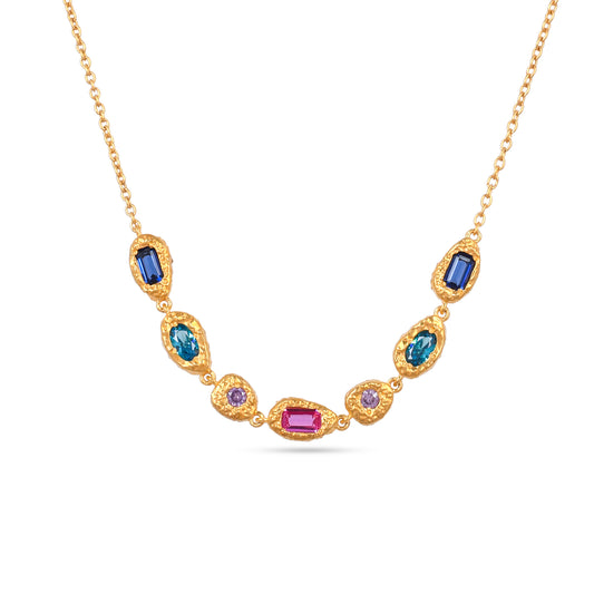 Gold necklace with colorful gemstones on a white background