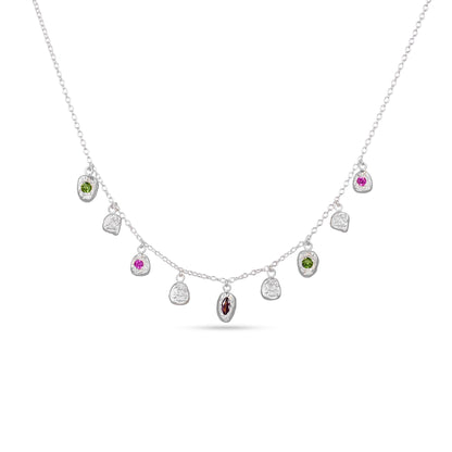 Necklace with various gemstones on a white background