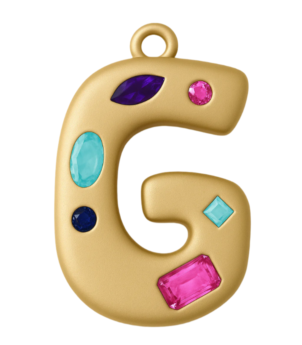 Gold letter 'G' charm with colorful gemstones on a white background