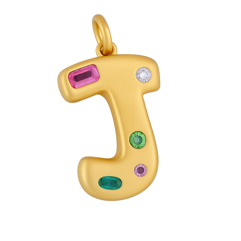 Gold letter 'J' pendant with colorful gemstones on a white background