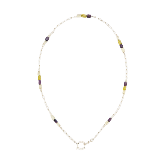 Beaded necklace with a silver clasp on a white background