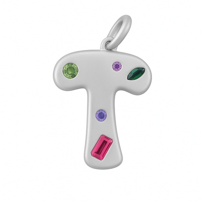 Silver T shaped pendant with colorful gemstones on a white background
